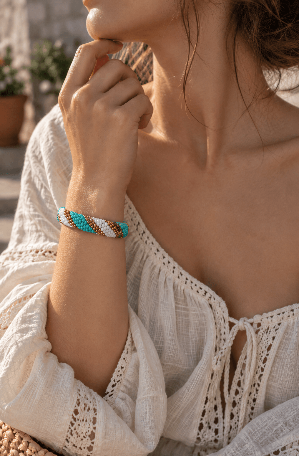 Turquoise, white, and gold beaded bracelet
